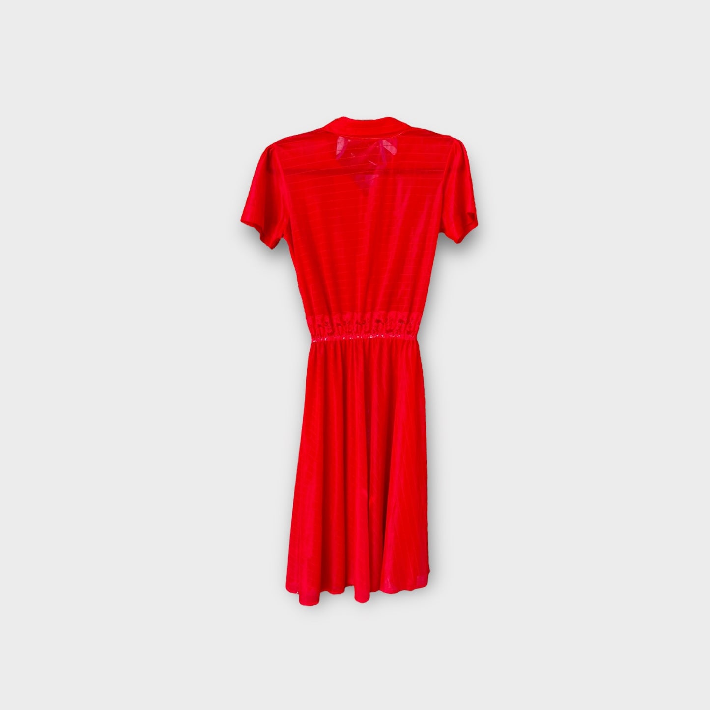 Vestido de color rojo, Transparentoso