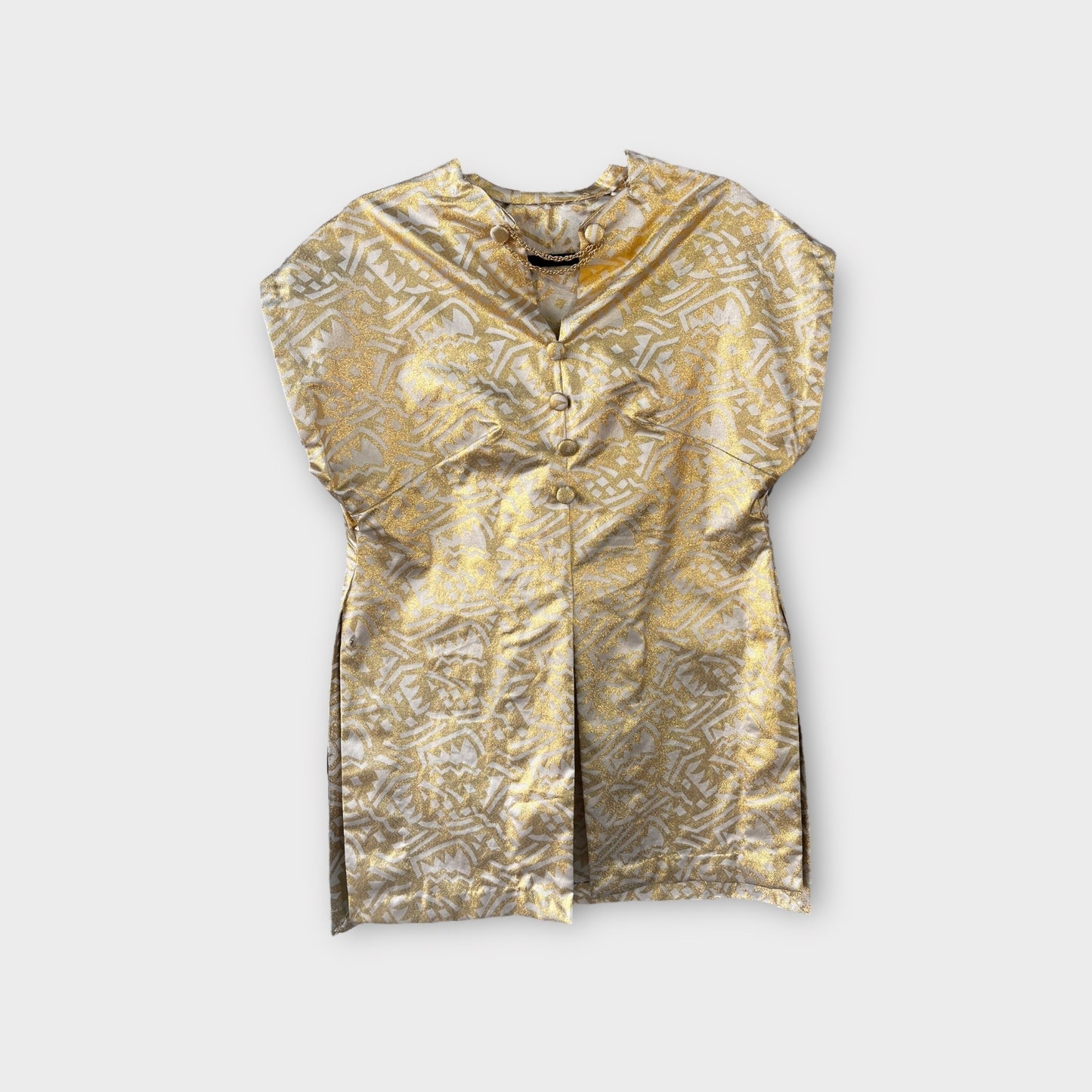 Blusa dorada