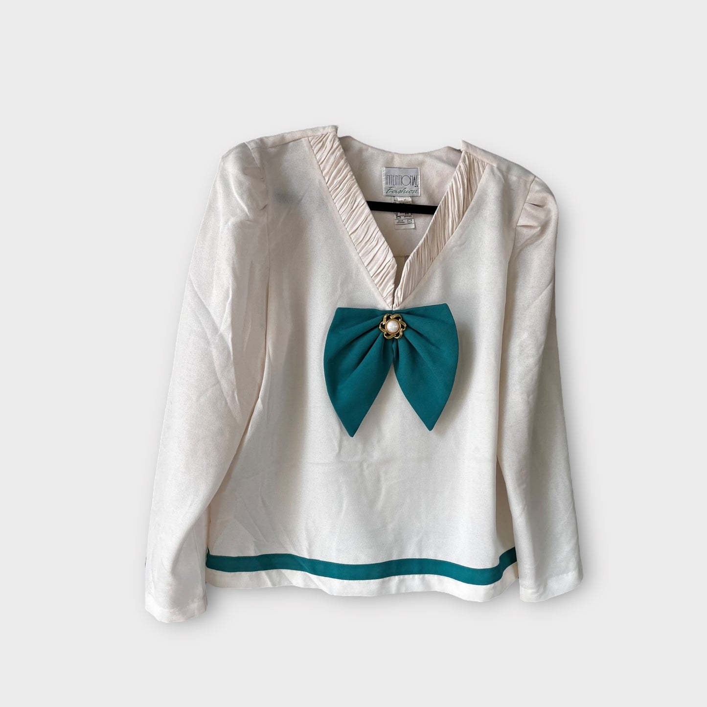 Conjunto beige con verde agua “Intentional”