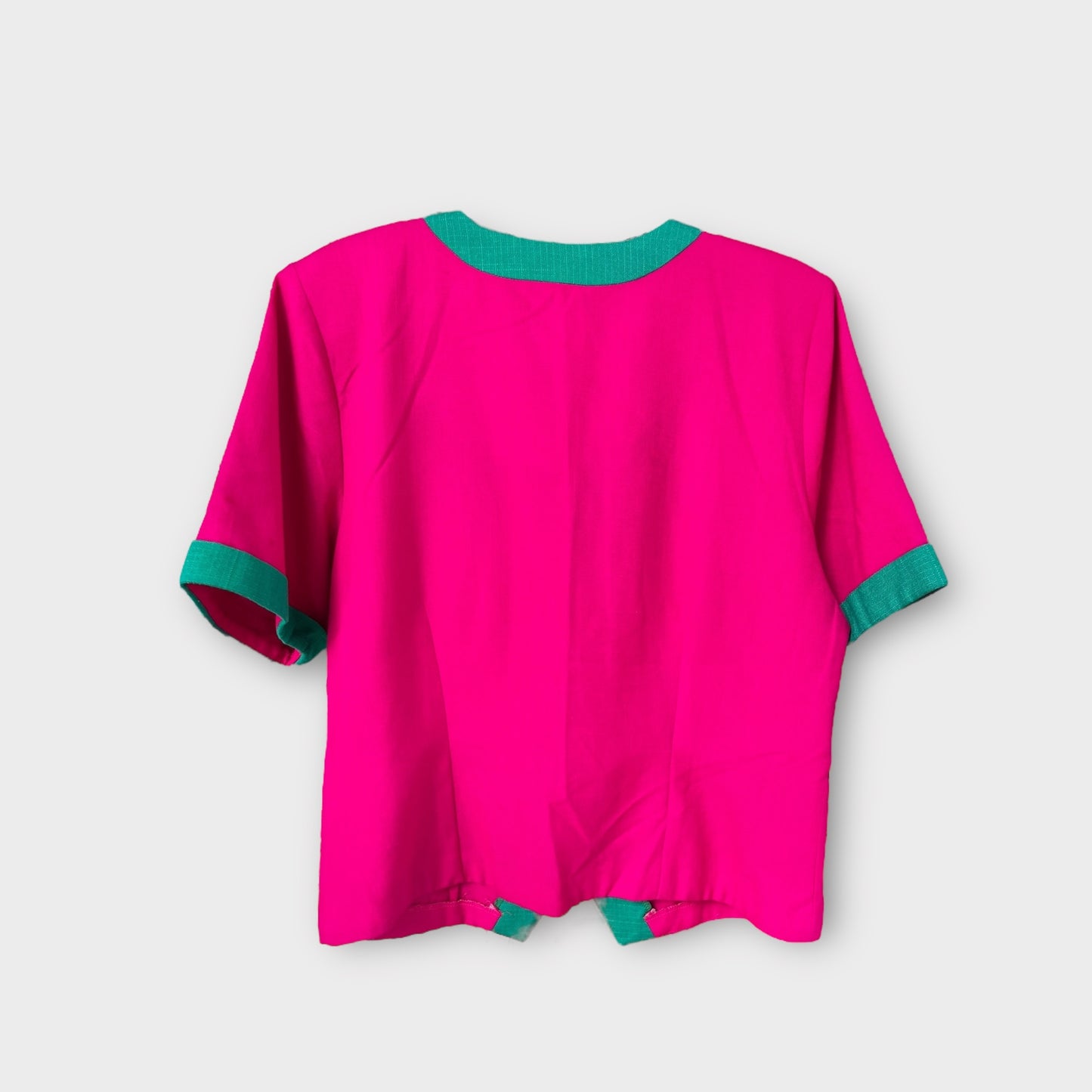 Conjunto de top y falda rosada “intentional”