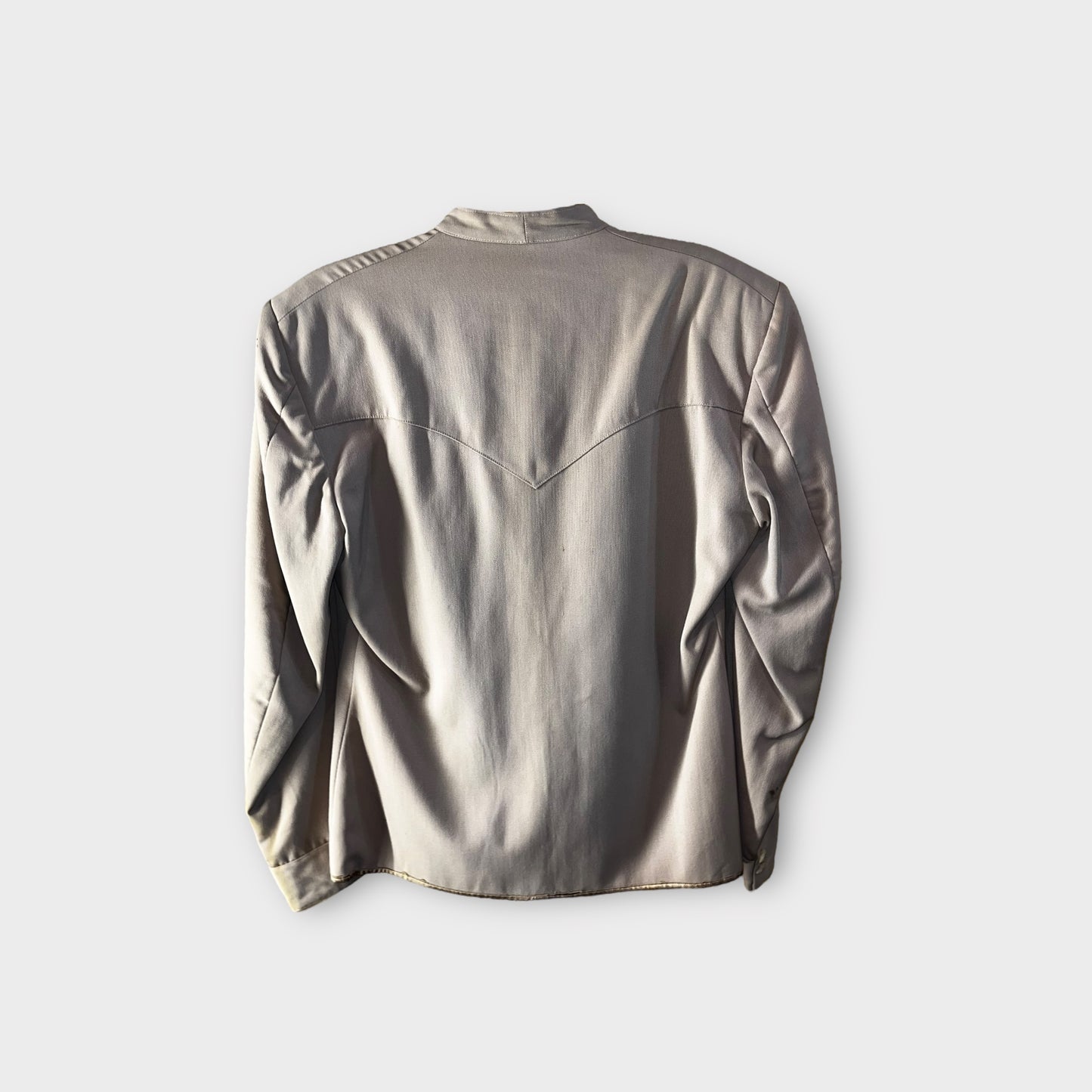 Chamarra beige satinado