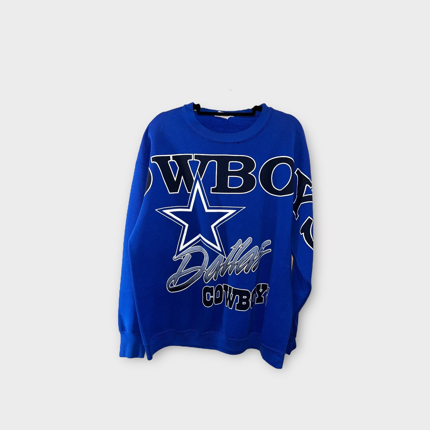 Sudadera azul con letras “cowboys”