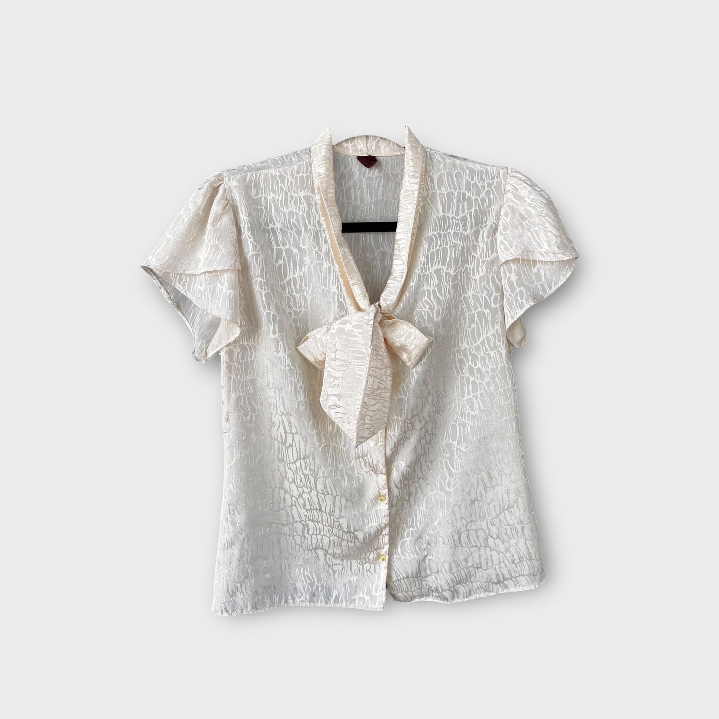 Blusa blanca con moño